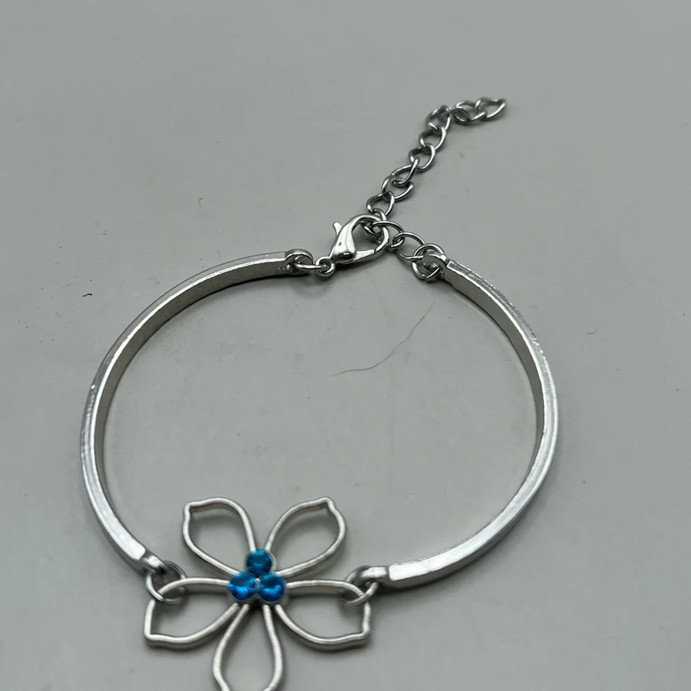 Silver Flower Bracelet with Blue Accents